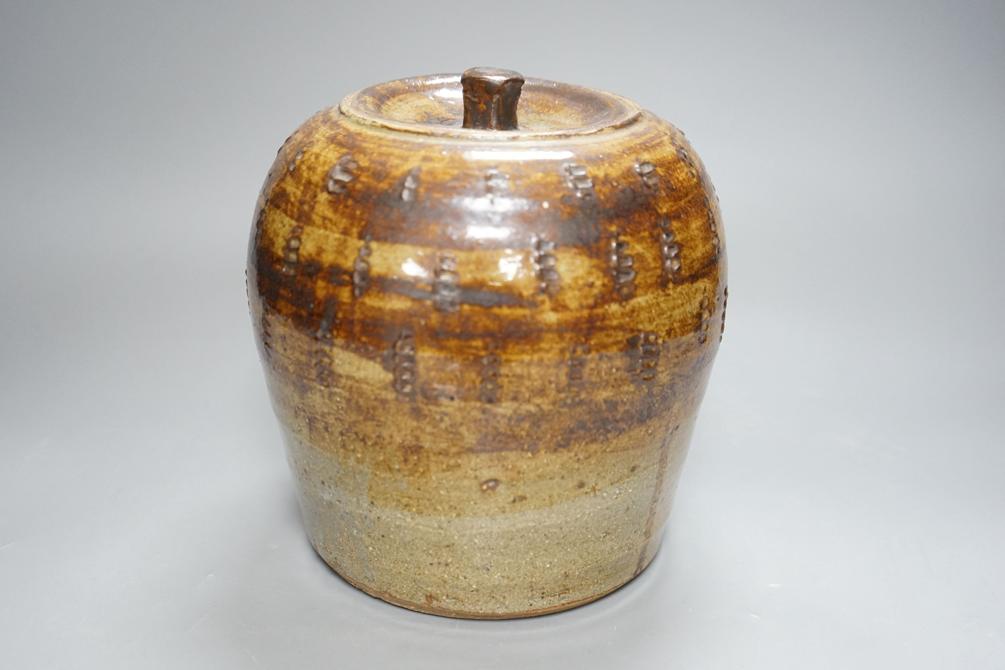 William Marshall (1923–2007), a brown glazed stoneware jar and cover, impressed mark, 22cm tall